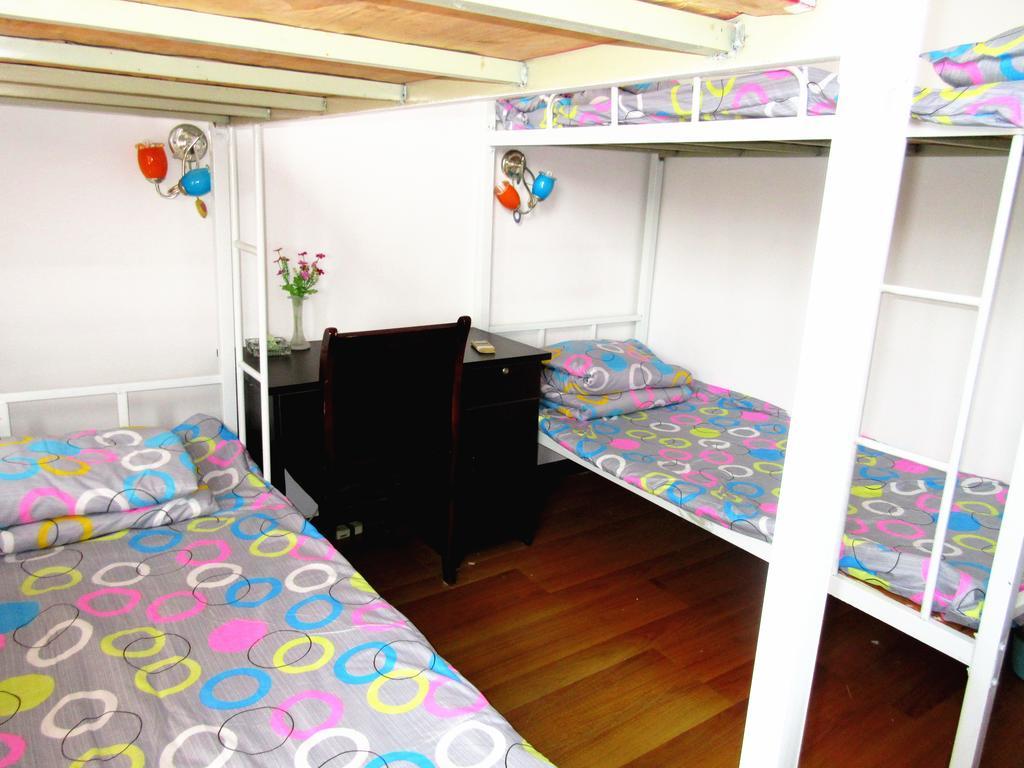 25°C Four Season Youth Hostel Qingdao Zimmer foto