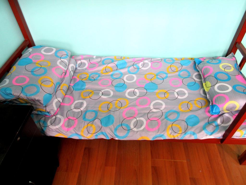 25°C Four Season Youth Hostel Qingdao Zimmer foto