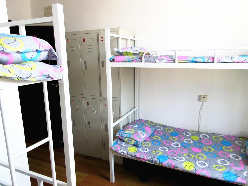 25°C Four Season Youth Hostel Qingdao Zimmer foto
