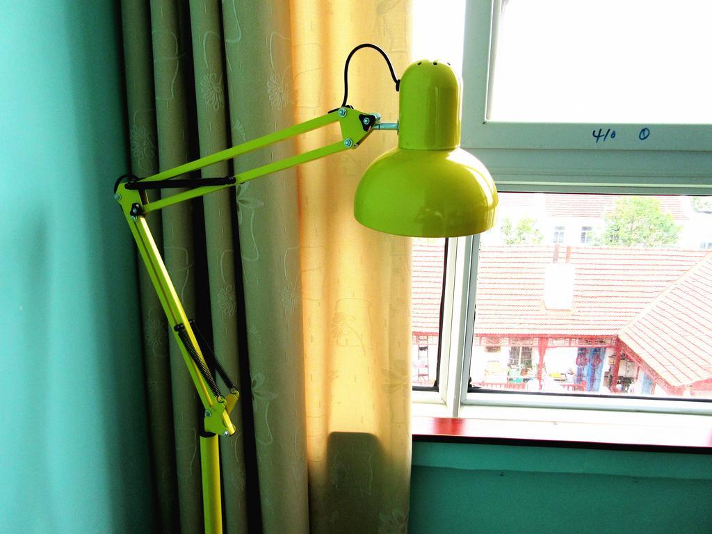 25°C Four Season Youth Hostel Qingdao Zimmer foto